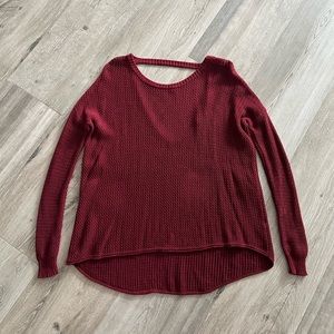 Red open back sweater